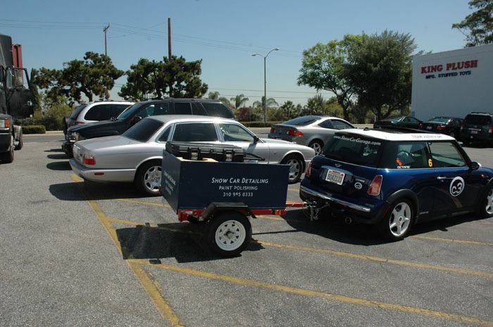 On location at a MINI meet — the trailer was the shop, the parking lot was the floor. ShowCarDetailing was already building a reputation.