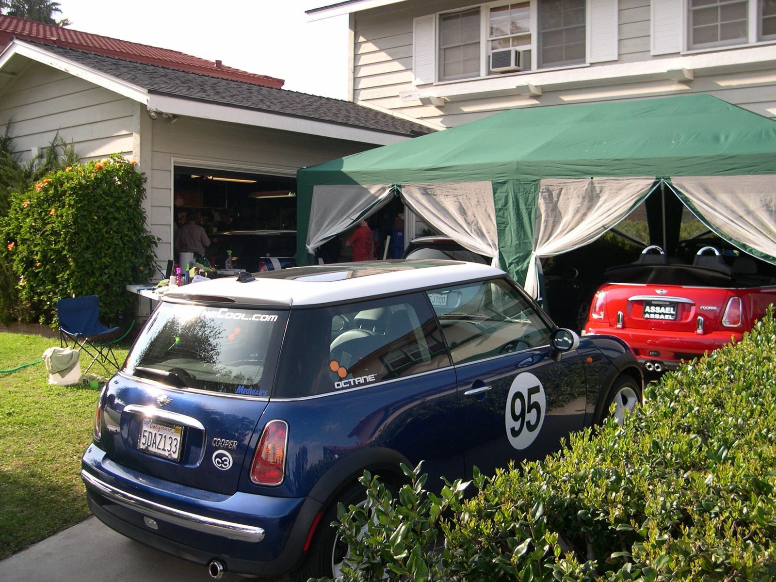 A driveway, a tent, two MINIs, and a full detailing clinic. This is how ShowCarDetailing ran events before there was a shop.