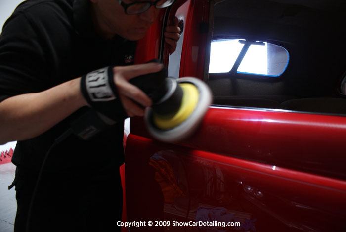 Paint correction on a luxury vehicle — the modern shop era