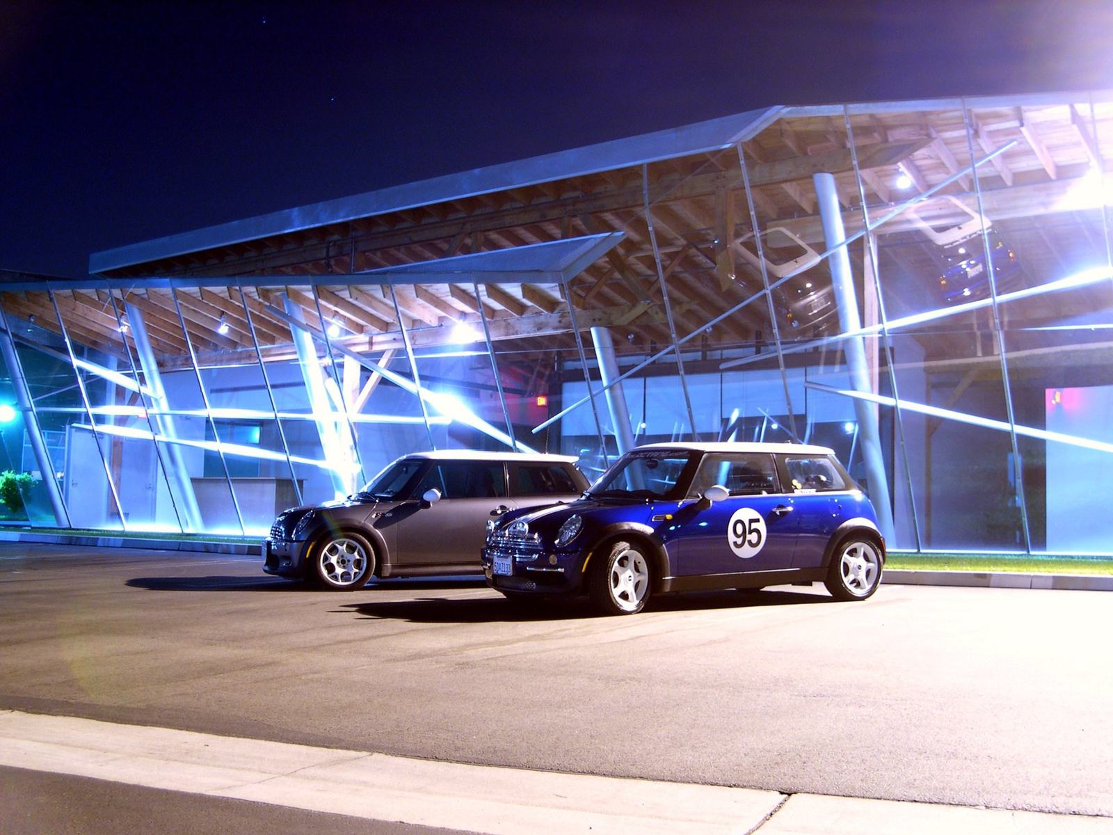 Two MINIs, one night. The blue #95 alongside another build — Richard was already part of a community of obsessives.
