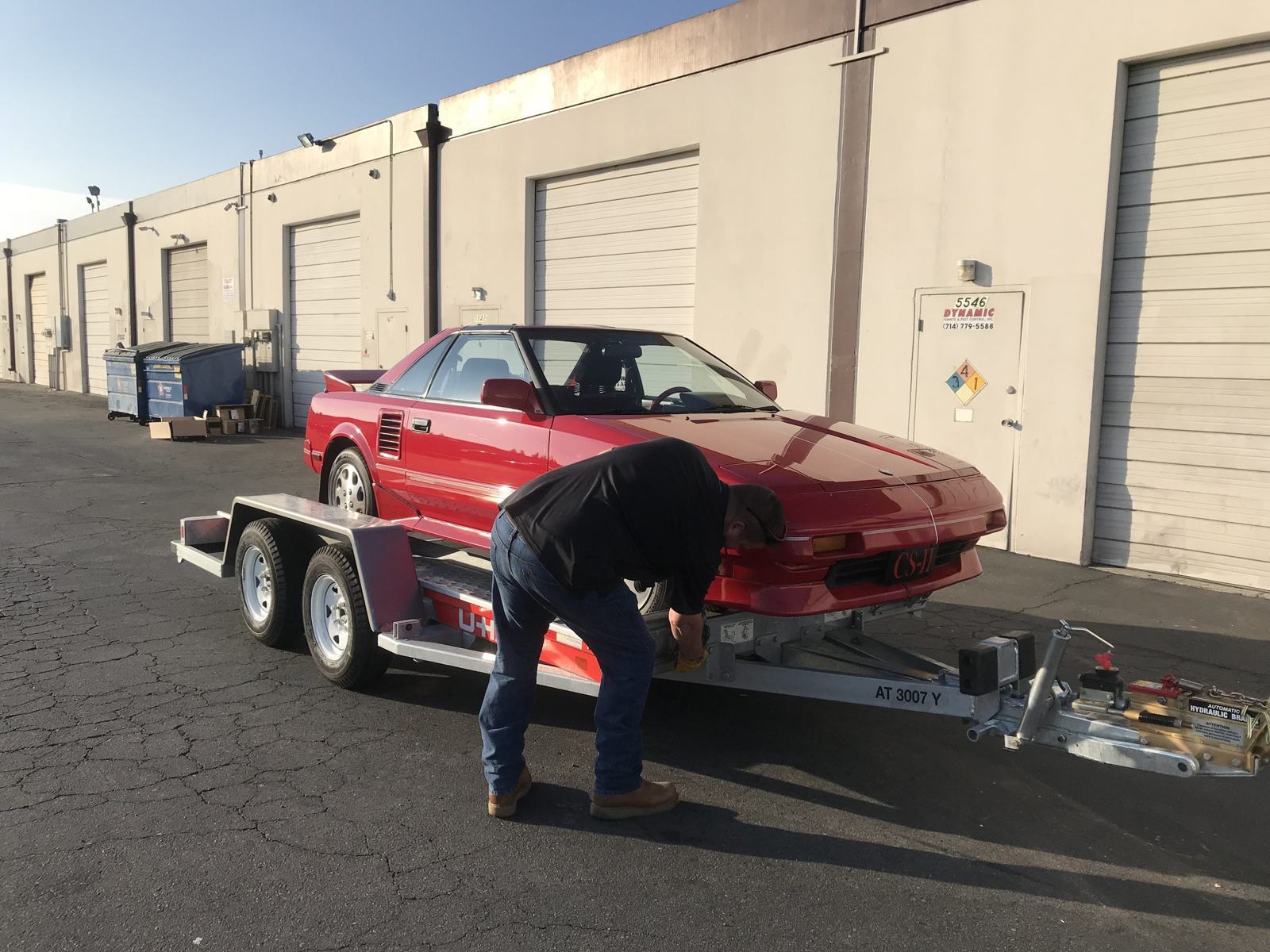 Loading the MR2 at the shop — ready for the drive to Las Vegas
