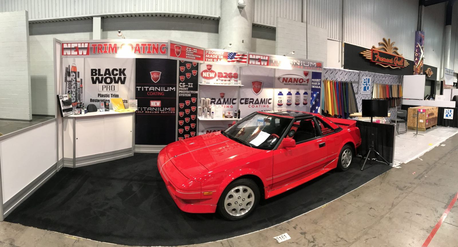 Crowds gathering around the unmolested AW11 — a rare sight at SEMA