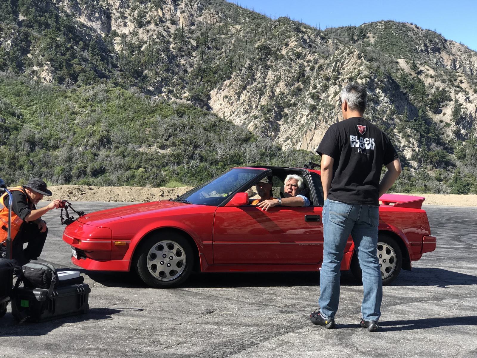 Jay Leno behind the wheel of the AW11
