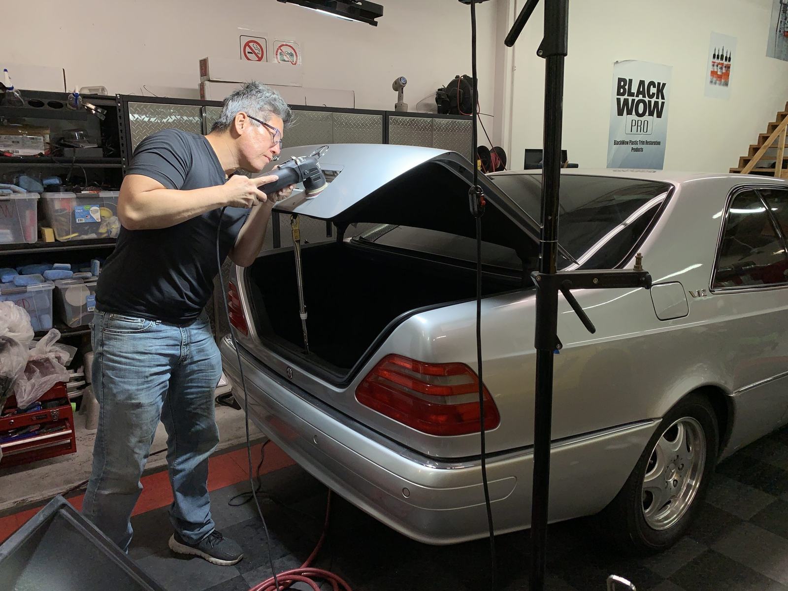 Detail work on an exotic — every car gets the same attention